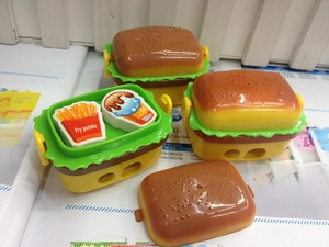 Detail of hamburger pencil sharpener showing inner french fry and ice cream shaped erasers