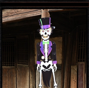 Hanging skeleton gentleman decoration for Halloween with purple suit and top hat