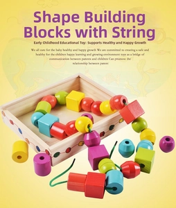 Detail of colorful wooden geometric beads and green threading cord for motor skill training