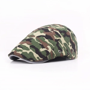 Detail of woodland camouflage flat cap featuring metal eyelets and premium fabric texture