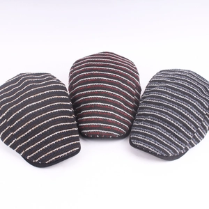 Three striped knit ivy caps in black, brown, and red colors for autumn and winter warmth
