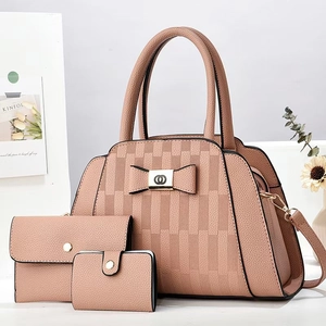 Three-piece apricot pink tote bag set with geometric embossed pattern and bow detail