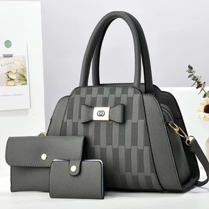 Three-piece dark gray pebbled leather handbag set with bow and gold-tone hardware