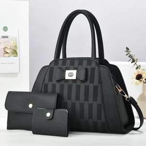 Three-piece set of black pebble leather handbags with chic plaid patterns and bow detail