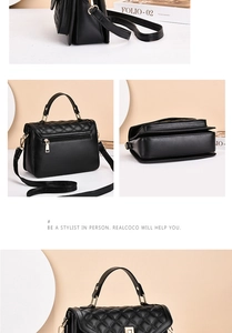 Détail du sac à main en cuir matelassé noir avec poignée en métal doré et bandoulière