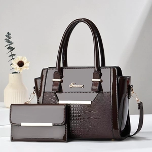 Dark brown patent leather handbag and wallet set with glossy crocodile texture finish