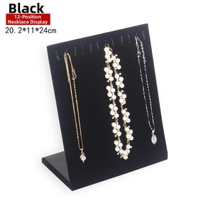 Detailed view of black flocked 12-slot necklace display stand with L-shape dimensions