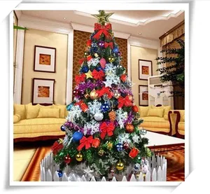 Detailed view of decorated Christmas tree with laser foam ornaments and white fence