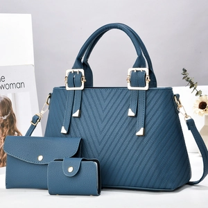 Set borse tre pezzi in pelle blu scuro con motivo trapuntato a V e portafoglio incluso