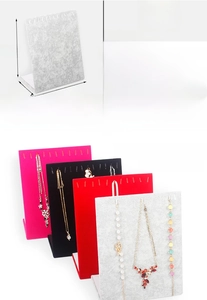 L-shaped jewelry display board with 12 hooks in four colors for necklaces and bracelets