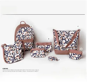 Allure floral pattern travel organizer set featuring navy fabric bags in multiple sizes