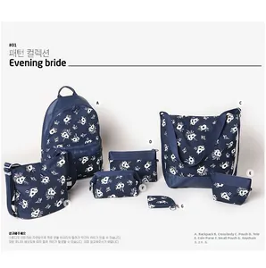 Detail of assorted blue floral canvas storage bags featuring the Evening Bride series design