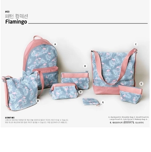 Detailed set of seven flamingo print travel organizer bags and matching backpacks