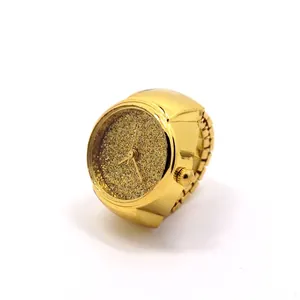 Elegant gold ring watch with shimmering glitter dial and flexible elastic metal strap