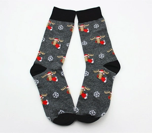 Detail of Christmas mid-calf socks featuring elk pattern and snowflakes in grey and red