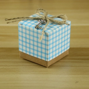 European plaid wedding favor box with kraft paper base and vintage key charm detail