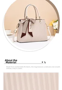Detailed macro view of the pleated PU leather texture and stylish floral scarf handle