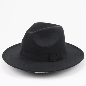 Detailed view of the wide brim and textured black felt ribbon on this wool jazz fedora