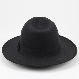 Detail of classic black wool fedora with teardrop crown and grosgrain ribbon band