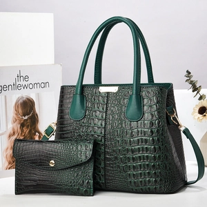 Dark green faux crocodile leather handbag set with gold hardware and shoulder strap