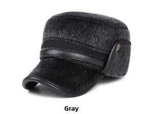 Detailed view of winter flat top cap featuring warm faux fur and leather trim earflaps