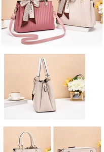 Detail of elegant PU leather handbags with vertical pleated texture and ribbon bow decoration