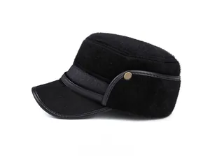 Detail of black faux fur flat top army cap with metal buckle and leather trim