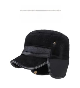 Close-up of black plush winter hat featuring faux fur texture and protective ear flaps