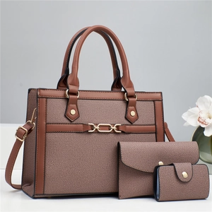 Three-piece brown patchwork canvas tote bag set with detachable shoulder strap and clutch
