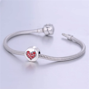 Pulsera de plata 925 con dije de corazón brillante y piedras de cristal rojo