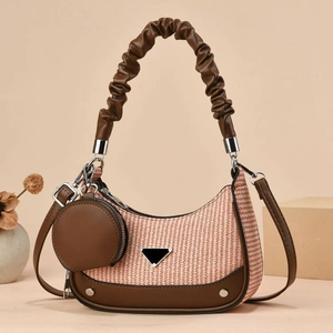 Retro beige woven shoulder bag with brown leather trim and scrunchie strap