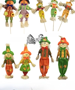 Detailed view of various cute Halloween scarecrow decorations for party props