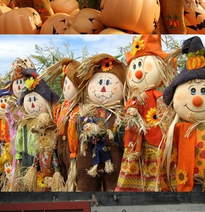 Detailed view of cute Halloween scarecrows with sunflower decor and fabric clothes.