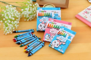 Detail of 8 and 24 color wax crayon sets for children with cute cartoon packaging