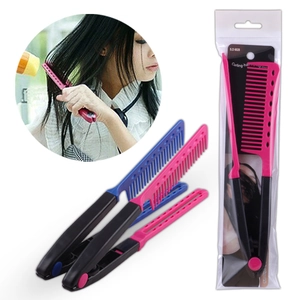 Pink and blue V-shaped hair straightening comb for styling with blow dryer