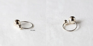 Detail of 925 sterling silver ring with polished beads and 1.2mm band thickness