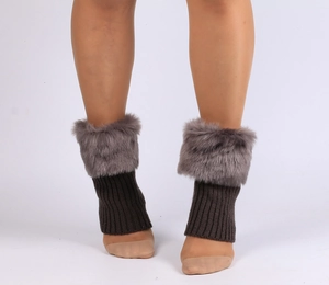 Detail of dark brown knit leg warmer with grey-brown faux fur trim for boots