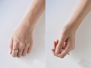 Detailed view of S925 sterling silver open ring with asymmetrical double metal beads