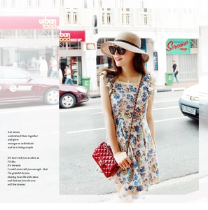 Close-up of summer floral dress with square neckline and ruffled double-layered sleeves