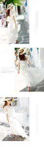 Detailed view of bohemian white lace top and layered maxi skirt for summer beach vacation