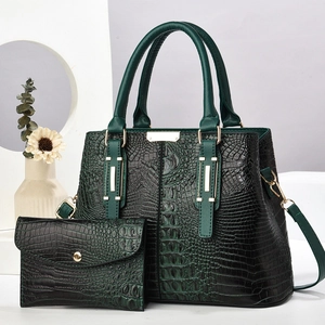 Dark green crocodile texture handbag and clutch set with gold-tone hardware detail