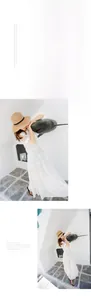 Close-up of elegant white lace top and layered maxi skirt for summer resort style