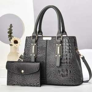 Modern dark grey crocodile embossed tote bag with matching pouch and golden hardware