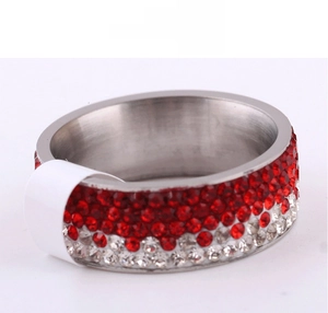Close-up of 8mm sterling silver ring with gradient red and white cubic zirconia stones