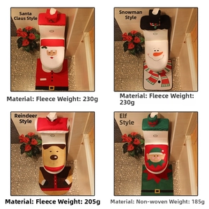 Macro detail of 4-piece Santa toilet seat cover set in festive red and green bathroom decor