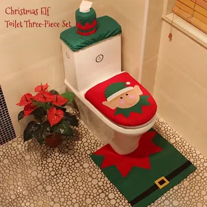 Three-piece Christmas elf toilet seat cover set with matching rug for festive bathroom decor