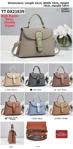 Detail view of woven vintage crossbody bag with dual zipper compartments and PU leather handle