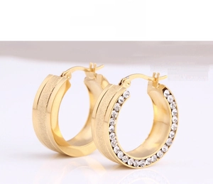 Detailed close-up of 8mm gold plated stainless steel hoop earrings with frosted finish and crystals