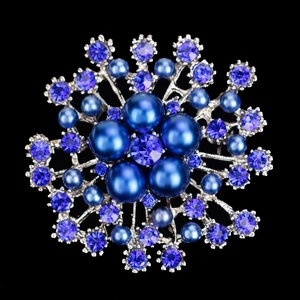Exquisite blue crystal and pearl snowflake brooch on silver metal floral setting