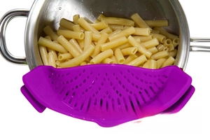Silicone clip-on pot strainer in purple for draining pasta and vegetables from cookware